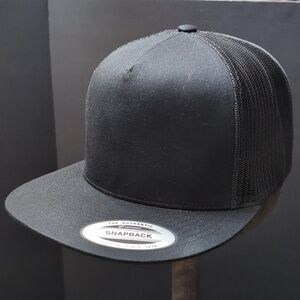 The Classics,Yupoong Men's Black Blank Snapback Trucker Hat.